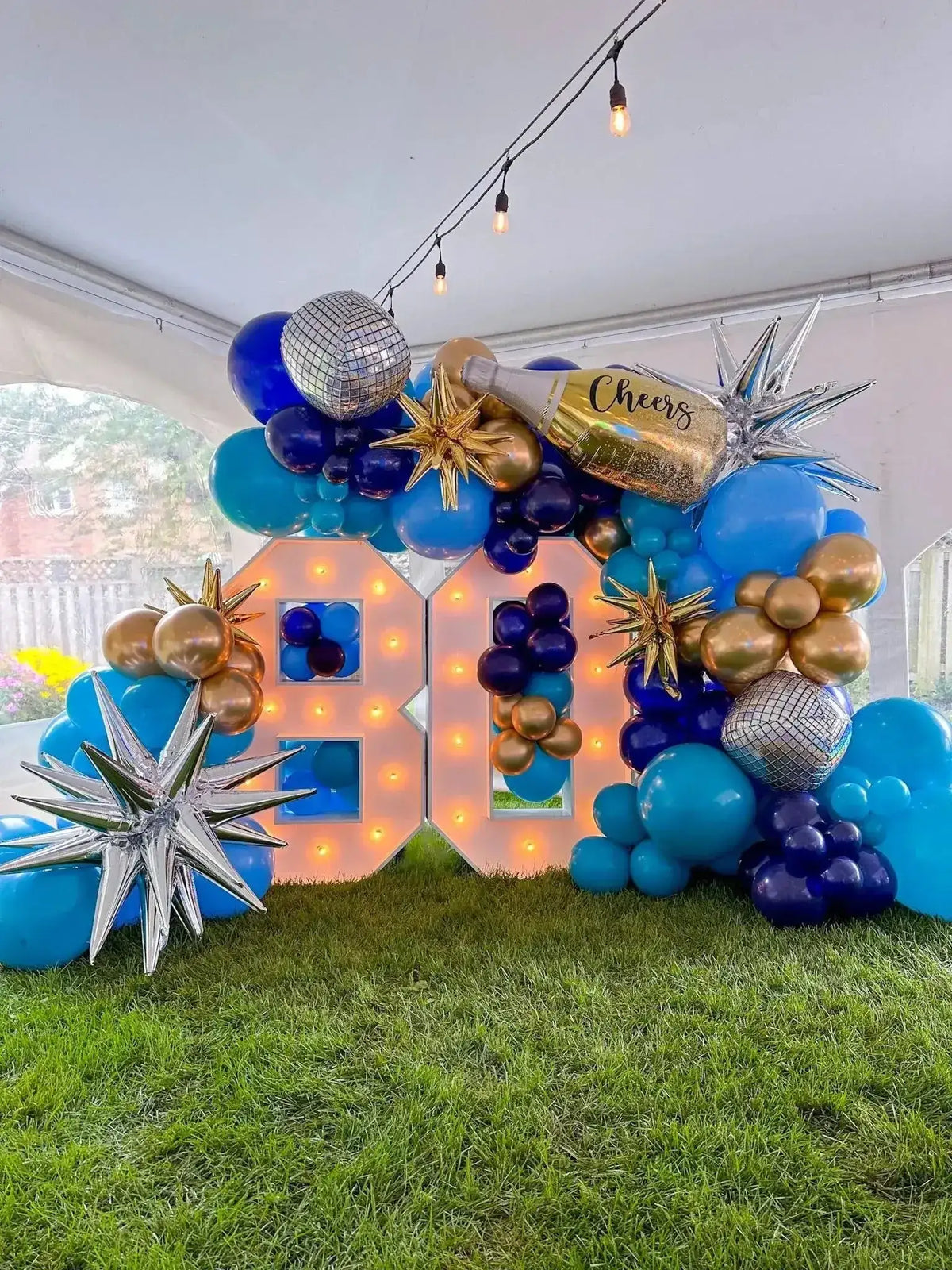 Bright decorative marquee lights in a festive balloon garland, perfect for celebrations and events.